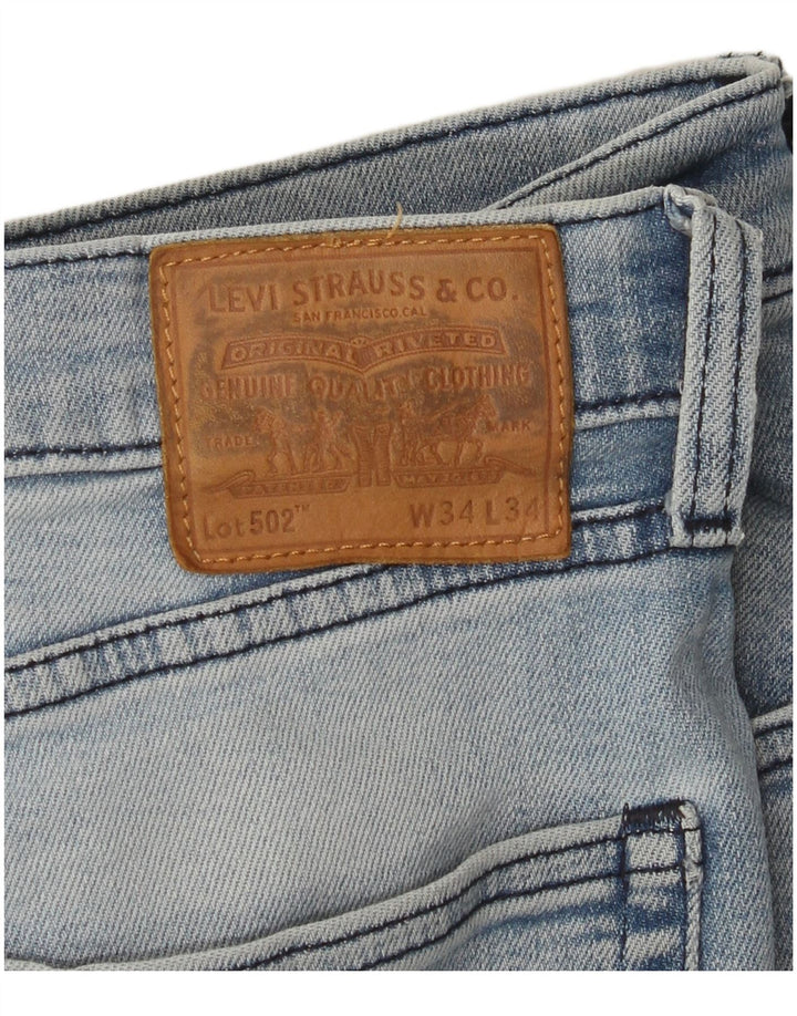 Мужские зауженные джинсы Levi's 502 W34 L34 синие