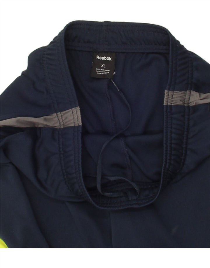 REEBOK Mens Tracksuit Trousers XL Navy Blue Colourblock Polyester Vintage Reebok and Second-Hand Reebok from Messina Hembry 
