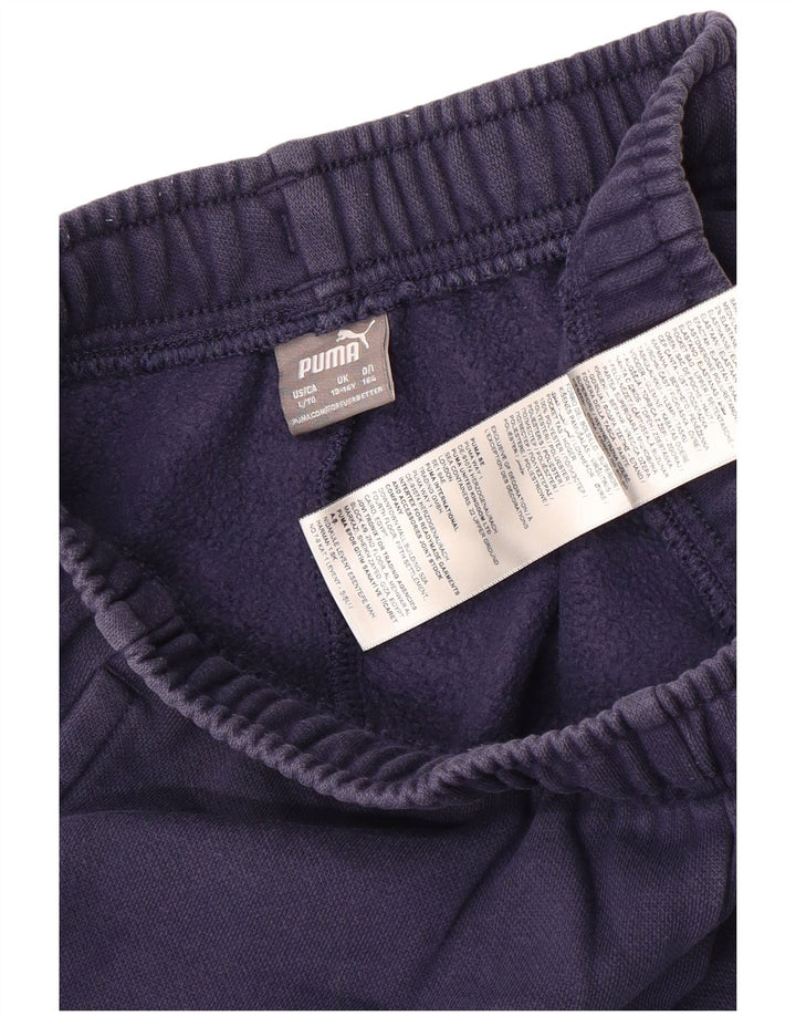 Спортивный костюм Puma для мальчиков с графическим рисунком Брюки-джоггеры 13–14 лет Темно-синие