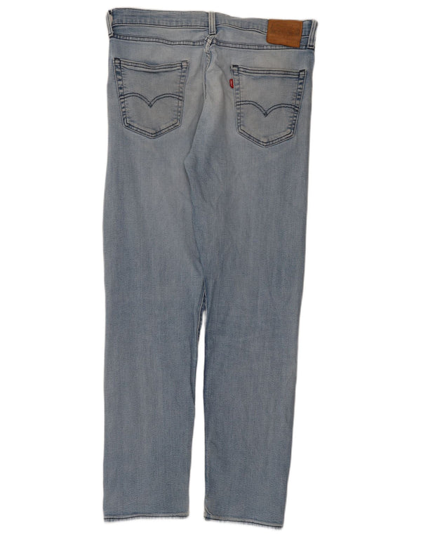 Мужские зауженные джинсы Levi's 502 W34 L34 синие