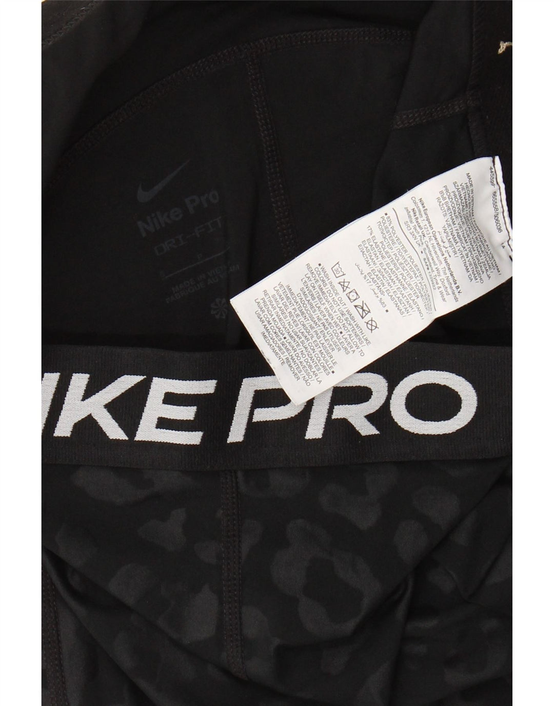 Женские леггинсы-капри Nike UK 8, маленькие черные полиэстер с животным принтом