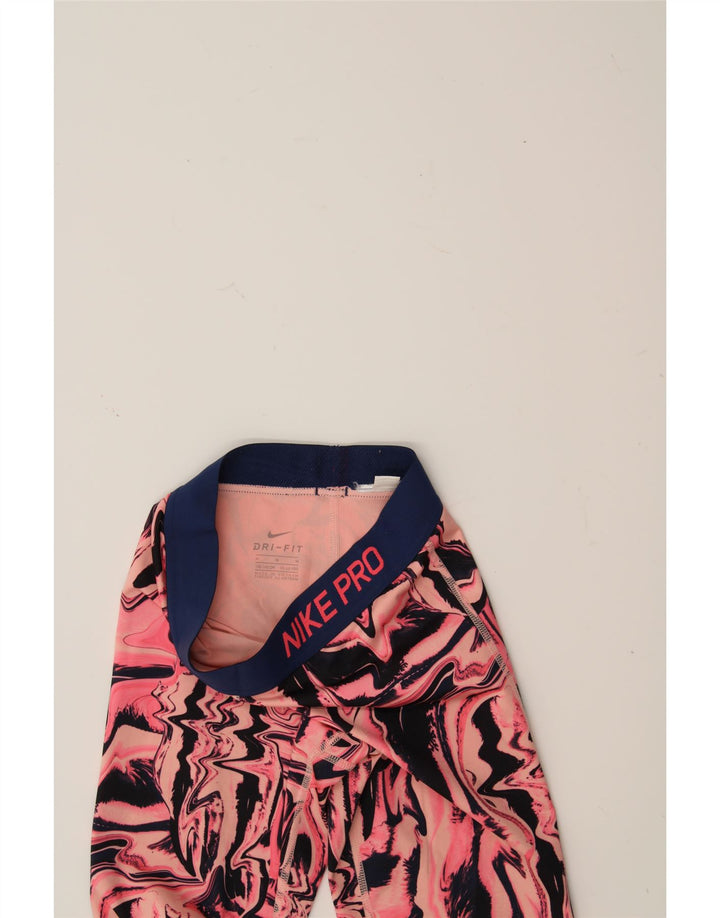 NIKE Girls Dri Fit Abstract Pattern Leggings 10-11 Years Medium Pink Vintage Nike and Second-Hand Nike from Messina Hembry 