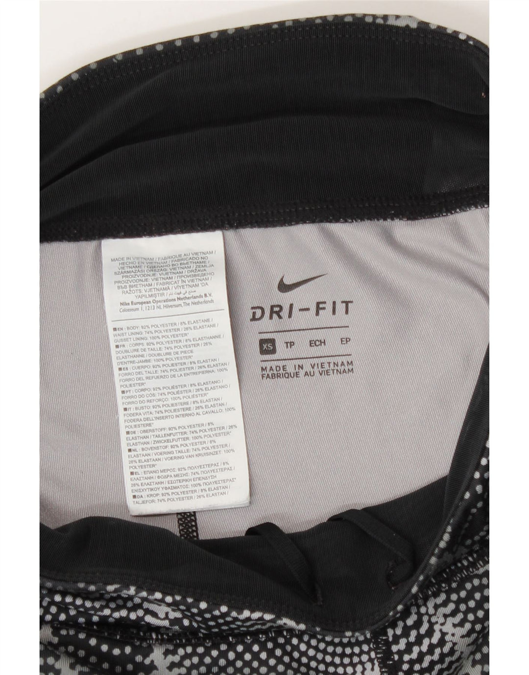 Женские леггинсы Nike Dri Fit UK 6 XS, черные полиэстер с геометрическим рисунком