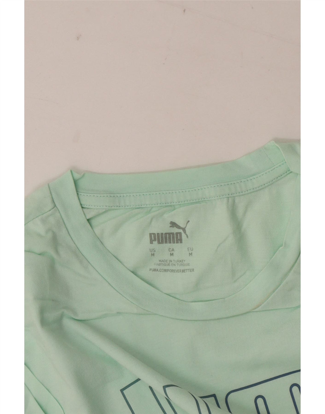 Женская футболка с рисунком Puma Top UK 14, средний зеленый цвет