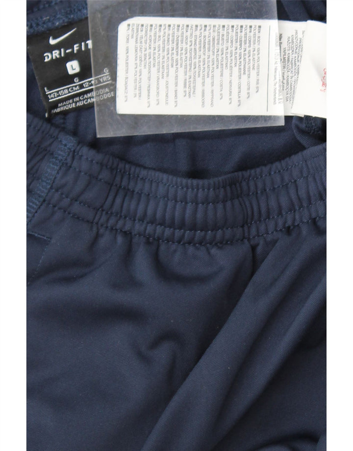 NIKE Boys Dri Fit Tracksuit Trousers 12-13 Years Large Navy Blue Polyester Vintage Nike and Second-Hand Nike from Messina Hembry 