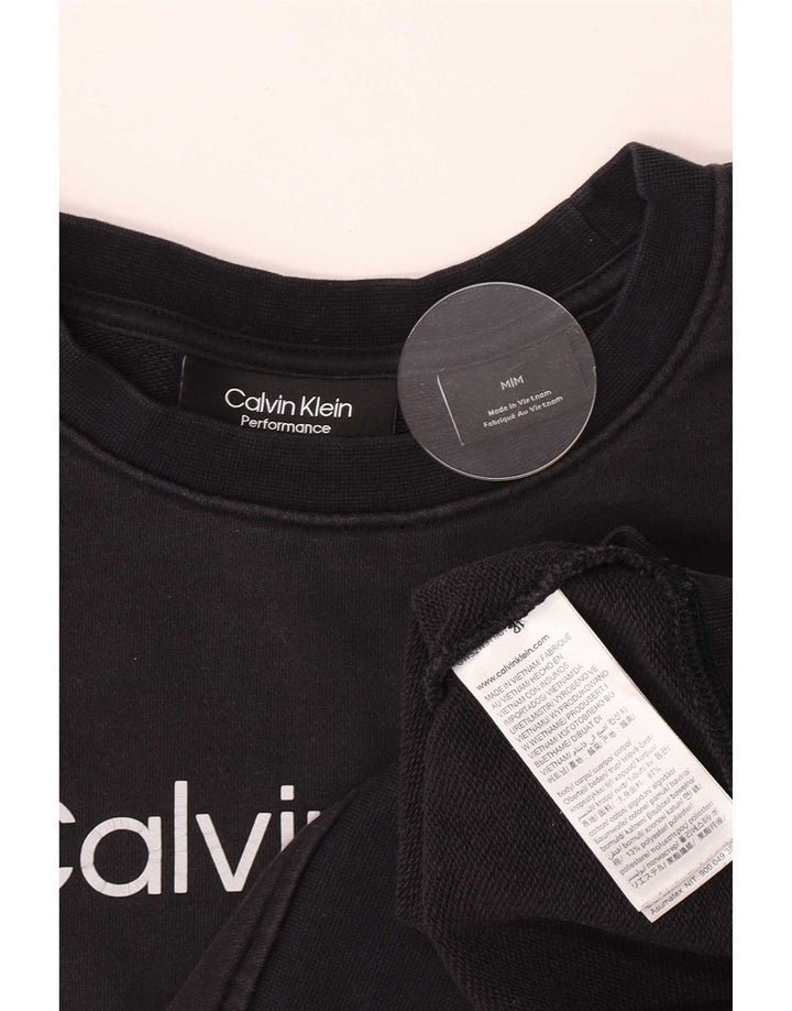 Женский укороченный свитшот с графическим рисунком Calvin Klein UK 14, средний темно-синий