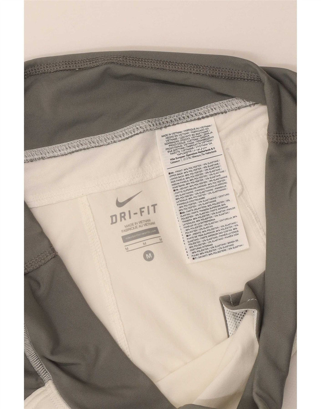 Женские спортивные брюки Nike Dri Fit UK 14, средние белые цветные блоки