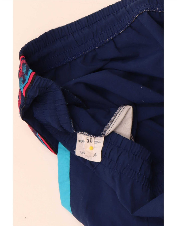 Мужские спортивные брюки Asics IT 50 Medium Navy Blue с цветными блоками