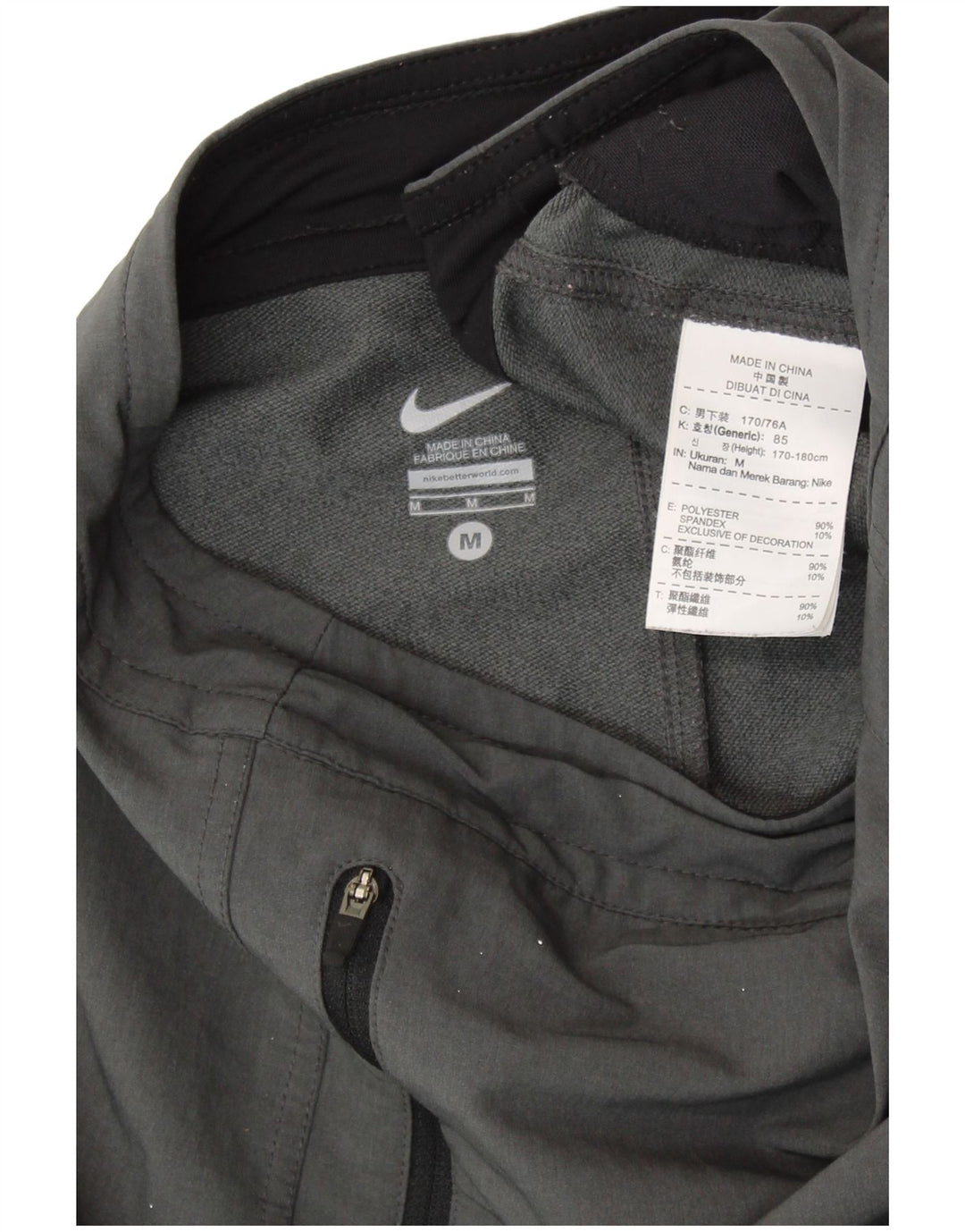 Мужские спортивные брюки NIKE из полиэстера среднего серого цвета