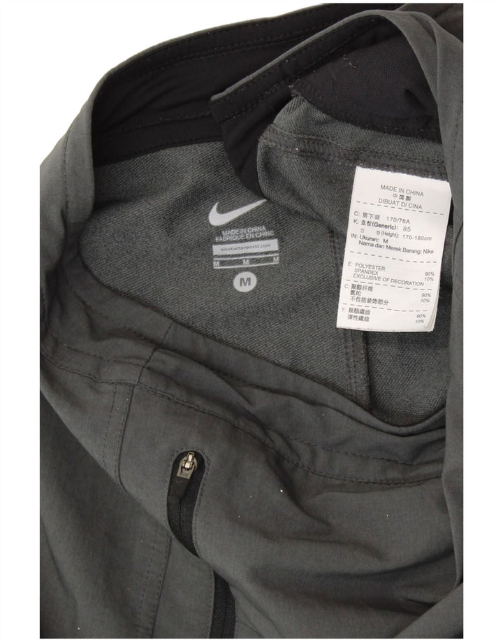 Мужские спортивные брюки NIKE из полиэстера среднего серого цвета