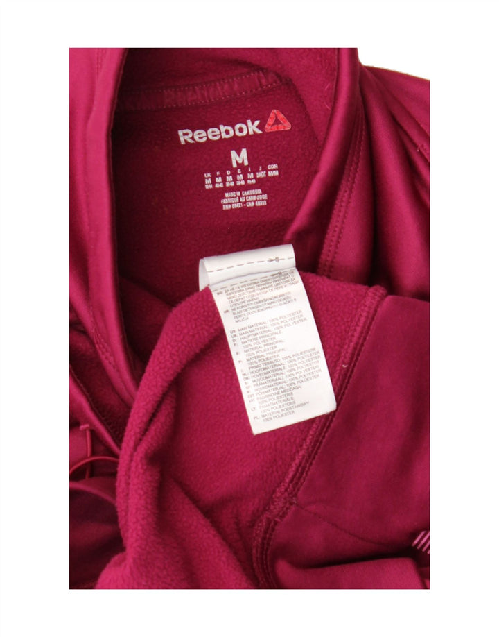 REEBOK Womens Graphic Sweatshirt Jumper UK 12/14 Medium Burgundy Polyester Vintage Reebok and Second-Hand Reebok from Messina Hembry 