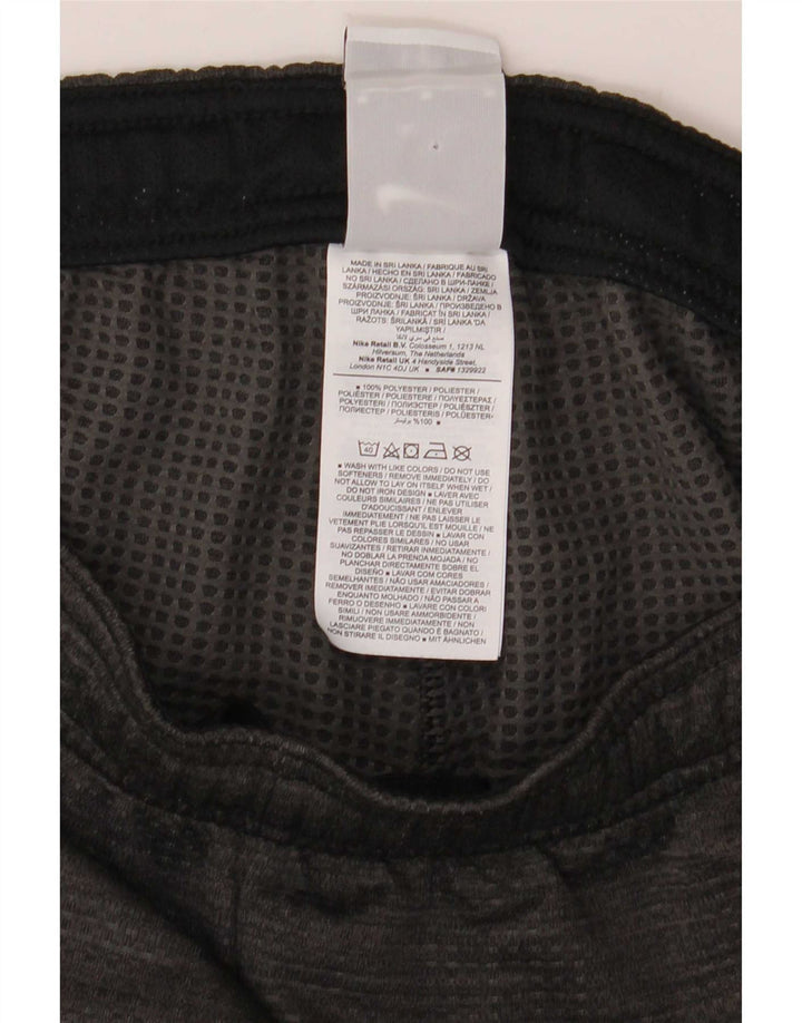 Мужские спортивные брюки Nike Dri Fit среднего серого цвета из полиэстера с крапинками