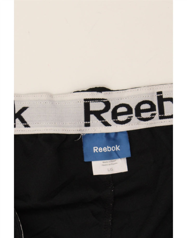 REEBOK Mens Tracksuit Trousers Large  Black Colourblock Polyester Vintage Reebok and Second-Hand Reebok from Messina Hembry 