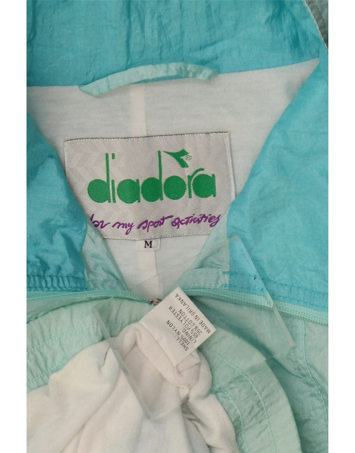 Женский спортивный костюм оверсайз Diadora, верхняя куртка UK 14, средний синий с цветочным принтом