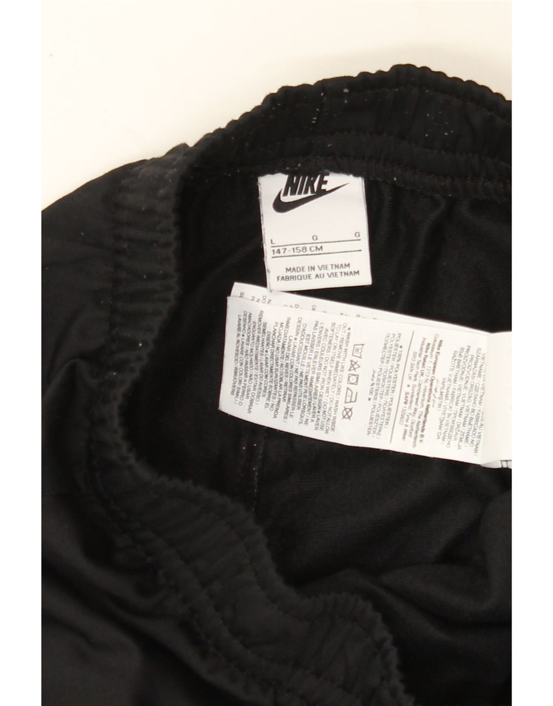 NIKE Boys Tracksuit Trousers Joggers 12-13 Years Large Black Polyester Vintage Nike and Second-Hand Nike from Messina Hembry 