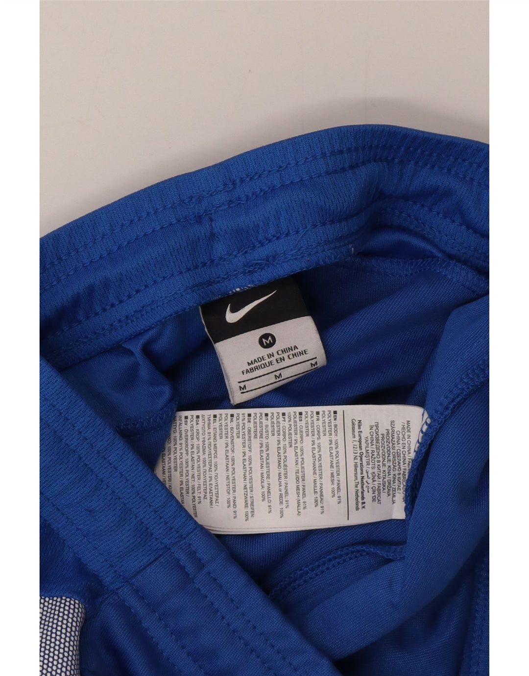 Мужские спортивные брюки Nike, средний синий полиэстер с цветными блоками