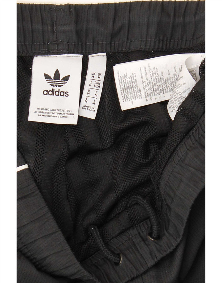 Мужские спортивные брюки Adidas для бега, средние черные полиэстер с цветными блоками
