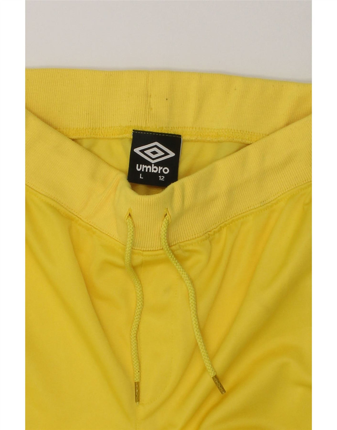 UMBRO Boys Graphic Sport Shorts 11-12 Years Large  Yellow Polyester | Vintage Umbro | Thrift | Second-Hand Umbro | Used Clothing | Messina Hembry 