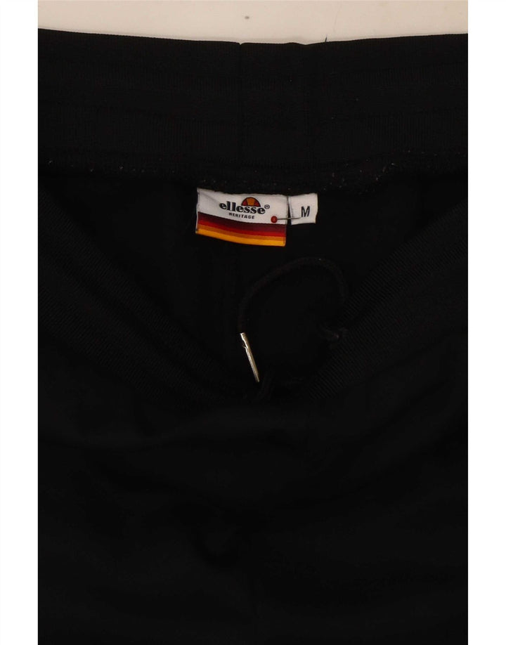 Ellesse Мужские спортивные брюки с графическим рисунком, средний черный, хлопок с цветными блоками