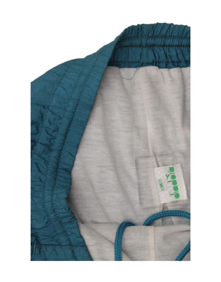 DIADORA Mens Tracksuit Trousers Joggers Medium Blue Nylon Vintage Diadora and Second-Hand Diadora from Messina Hembry 
