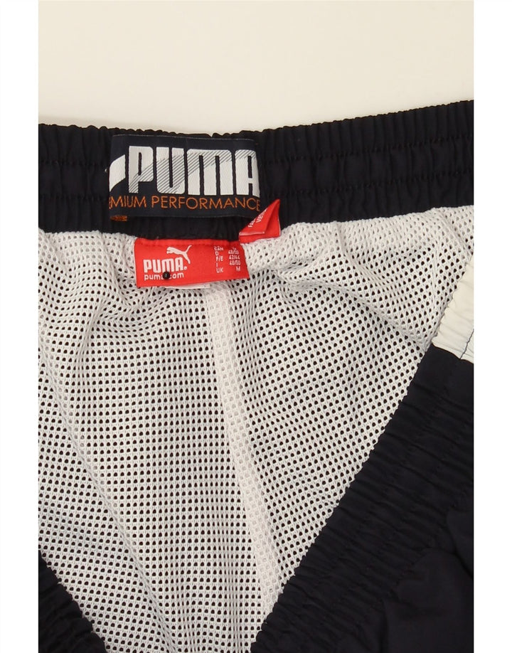 PUMA Mens Tracksuit Trousers Medium  Navy Blue Colourblock Vintage Puma and Second-Hand Puma from Messina Hembry 