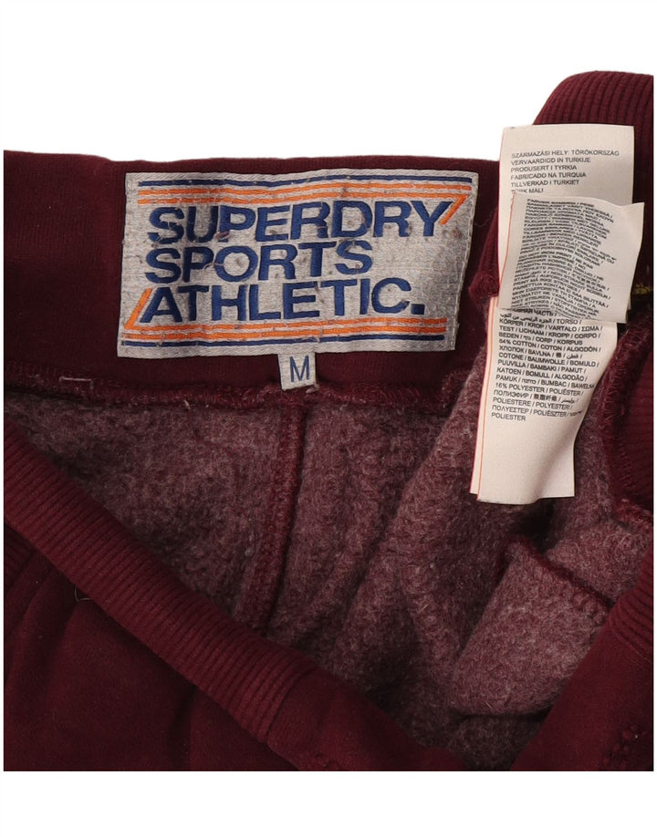 Мужские спортивные брюки Superdry с графическим рисунком, средние бордовые с цветными блоками