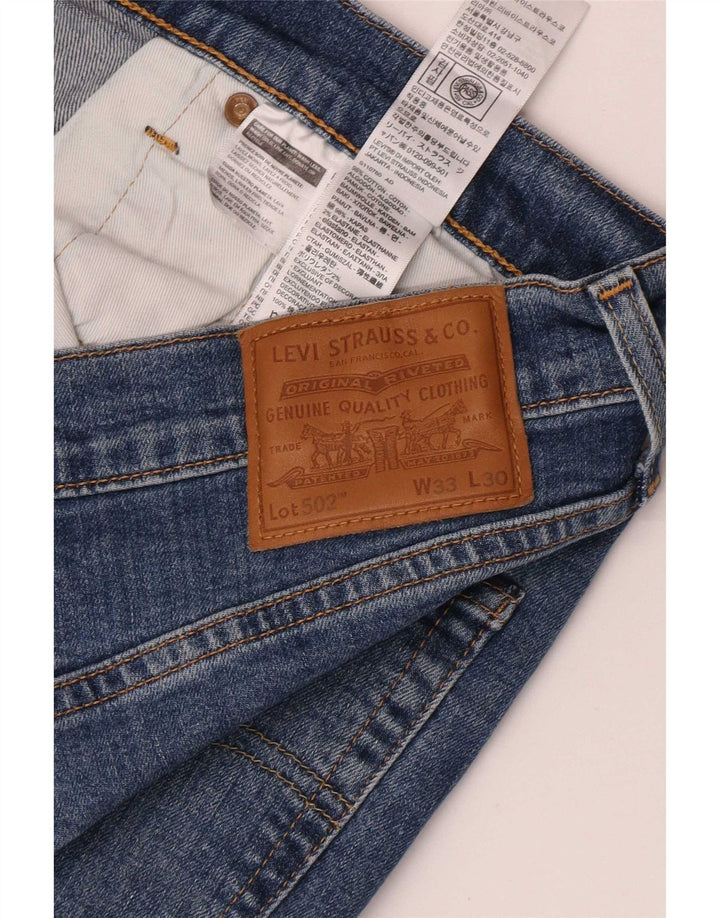 Мужские зауженные джинсы Levi's 502 W33 L30 синие, хлопок