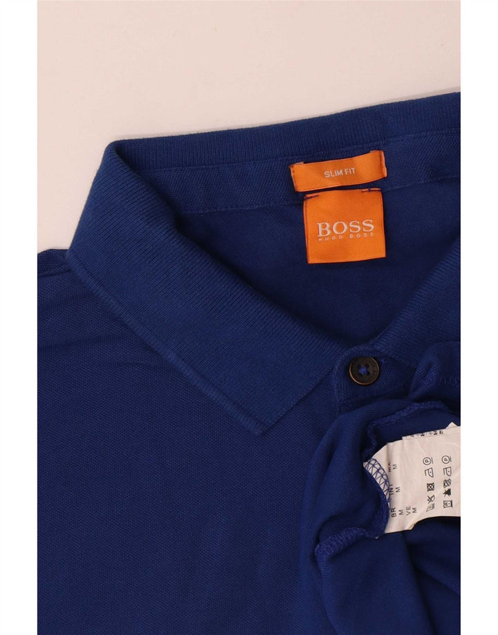 Мужская рубашка-поло приталенного кроя Hugo Boss, хлопковая, среднего синего цвета