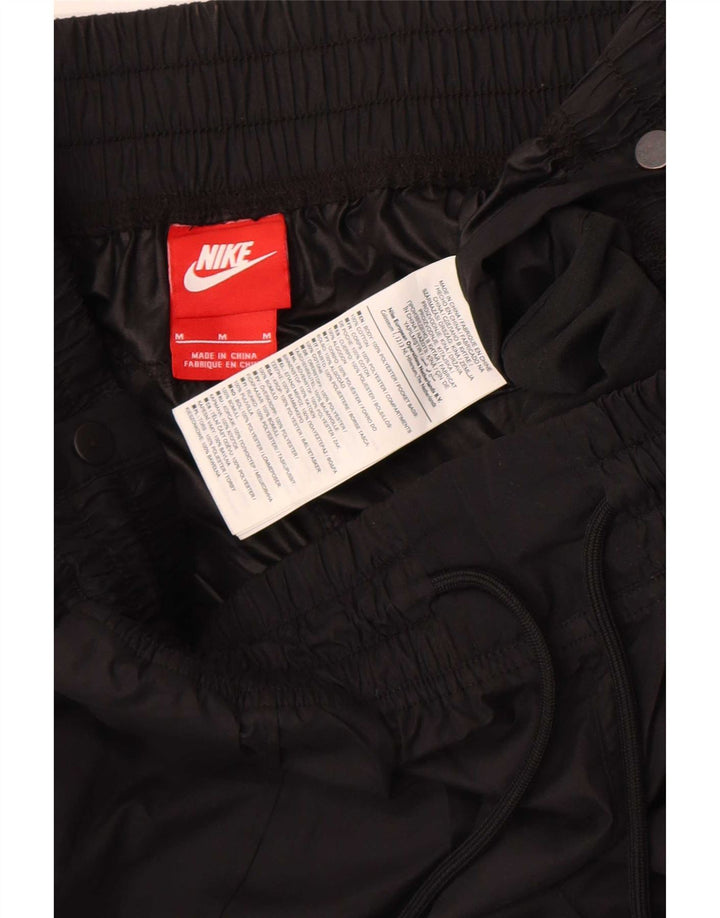Женские водонепроницаемые брюки Nike Joggers UK 12, средний черный полиэстер
