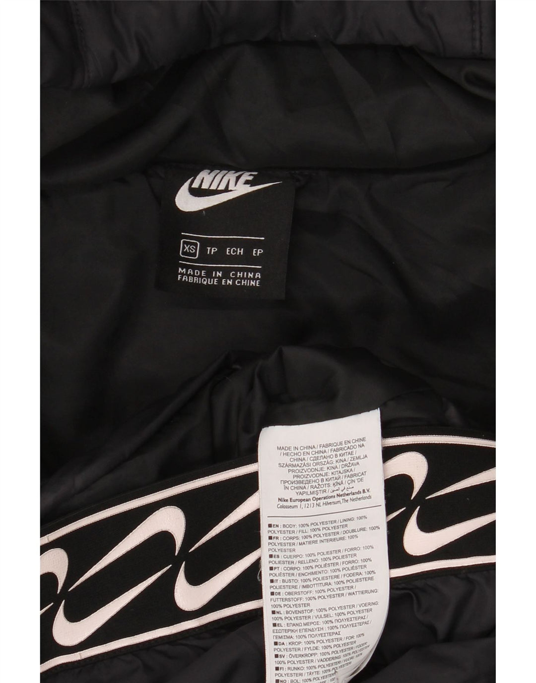 Женская утепленная куртка с капюшоном с графическим рисунком Nike UK 6 XS, черный полиэстер
