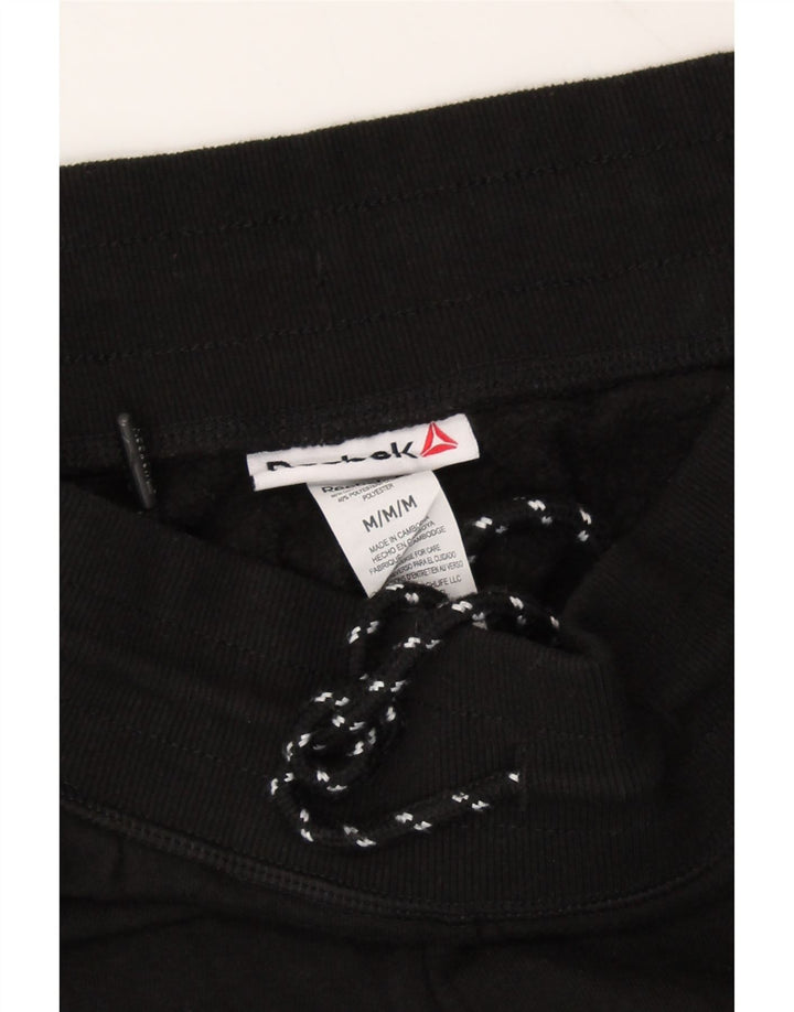 REEBOK Womens Graphic Tracksuit Trousers Joggers UK 14 Medium  Black Vintage Reebok and Second-Hand Reebok from Messina Hembry 