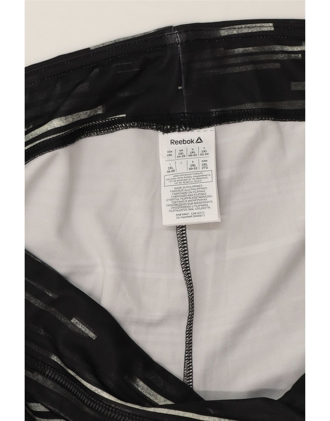 Женские леггинсы-капри Reebok UK 24/26 2XL, полиэстер в черную полоску