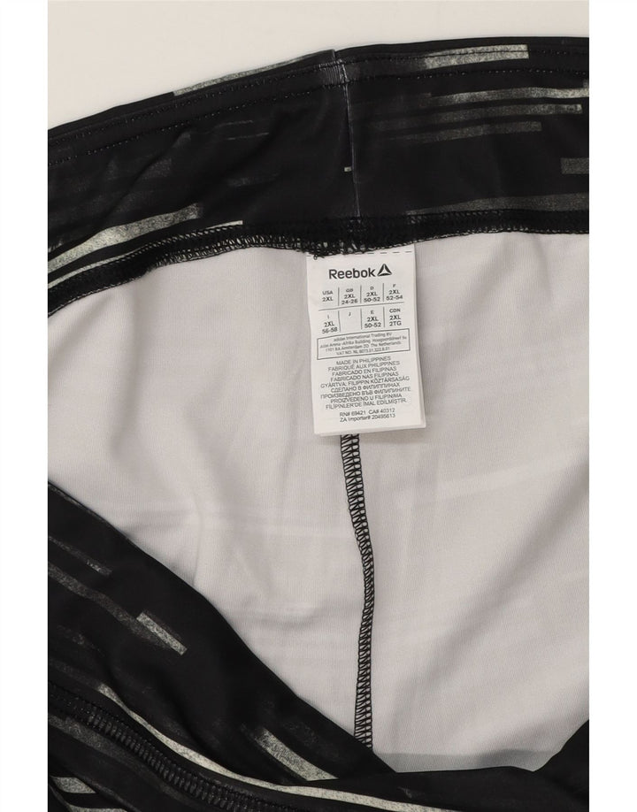 Женские леггинсы-капри Reebok UK 24/26 2XL, полиэстер в черную полоску