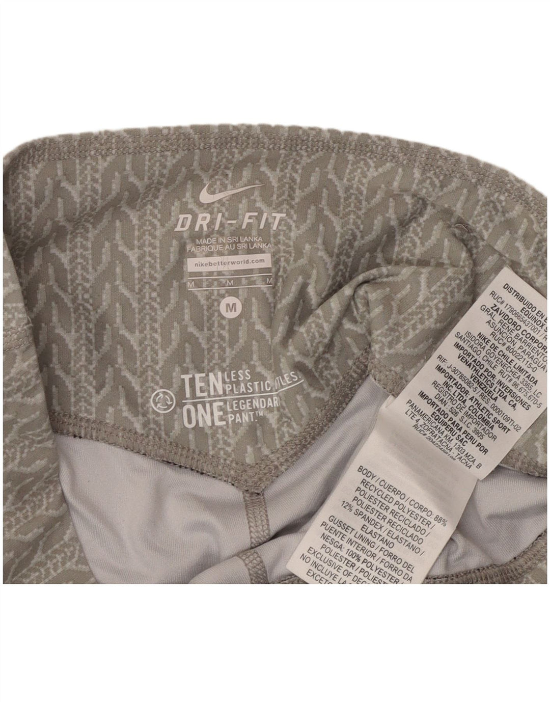 Женские леггинсы-капри Nike Dri Fit UK 14, полиэстер среднего серого цвета с геометрическим рисунком