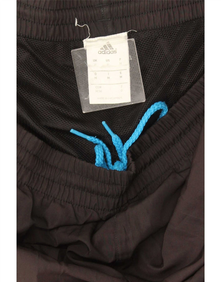 Мужские спортивные брюки Adidas среднего размера, черные с цветными блоками