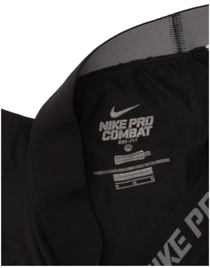 Женские леггинсы-капри с рисунком Nike Dri Fit UK 12, средние, черные