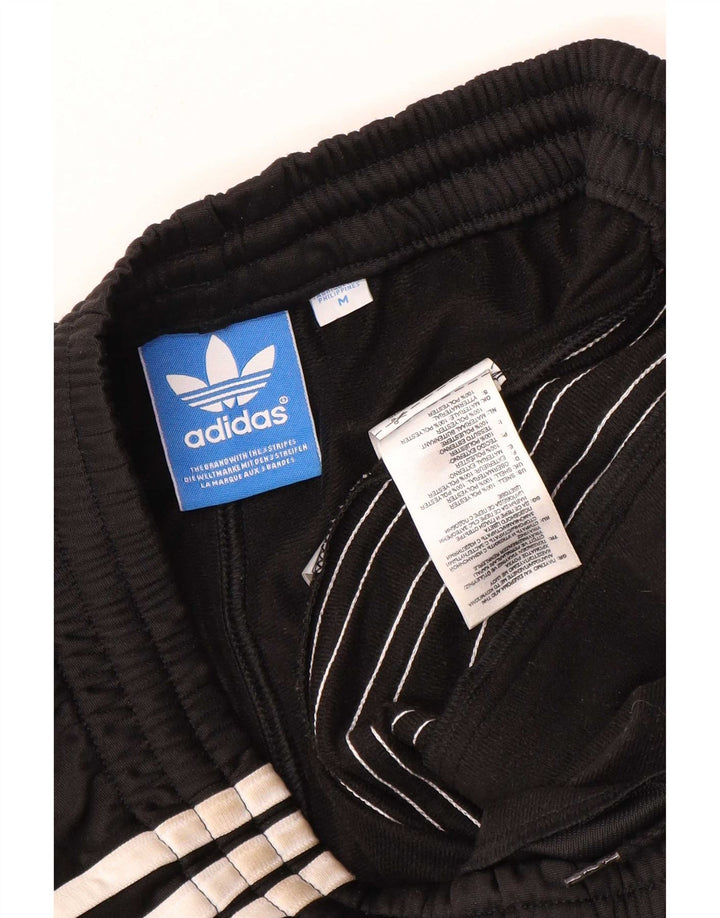 Мужские спортивные брюки Adidas среднего размера из полиэстера черного цвета