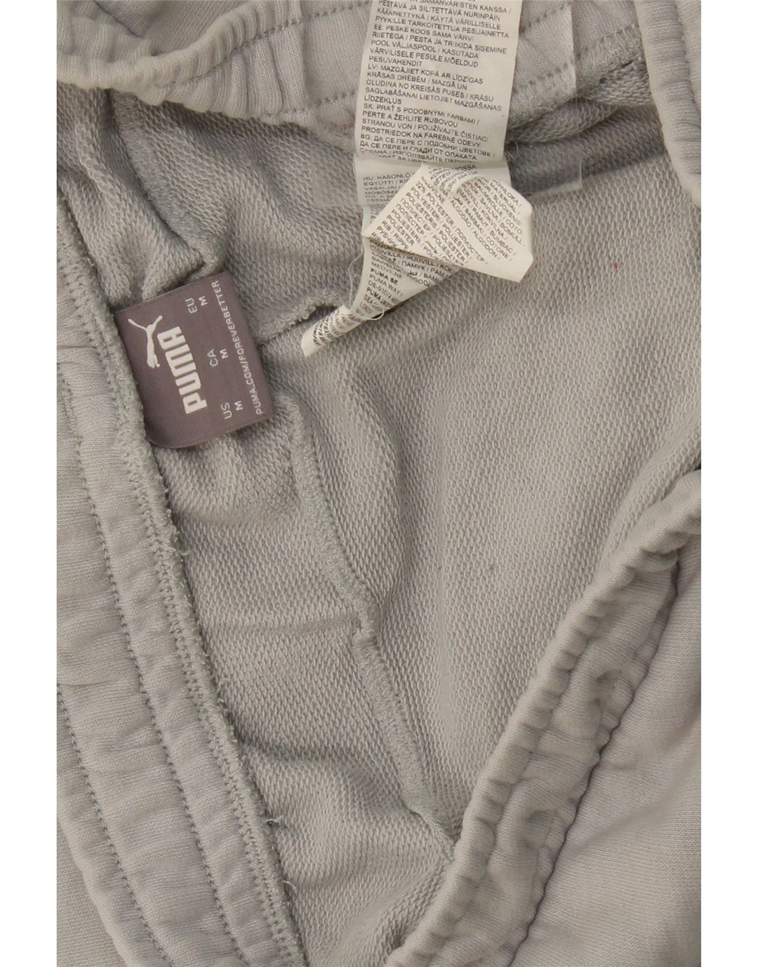 PUMA Мужские спортивные брюки с графическим рисунком Брюки-джоггеры Средне-серые с цветными блоками