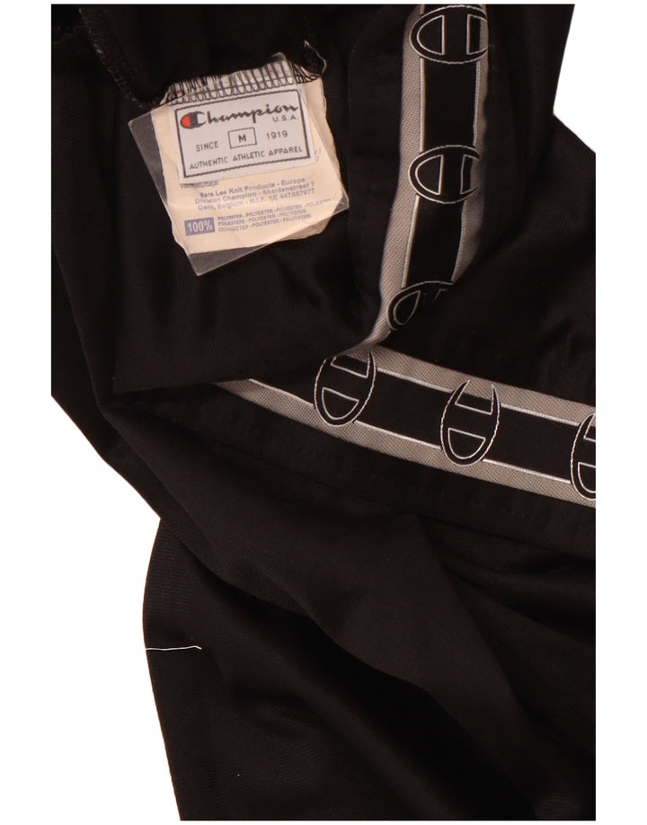 Женские спортивные брюки с графическим рисунком CHAMPION UK 12, средний черный полиэстер