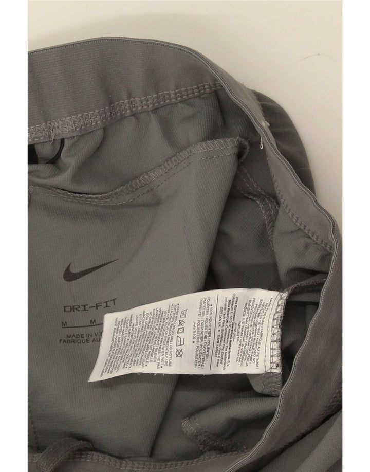 Мужские спортивные брюки Nike Dri Fit из полиэстера среднего серого цвета