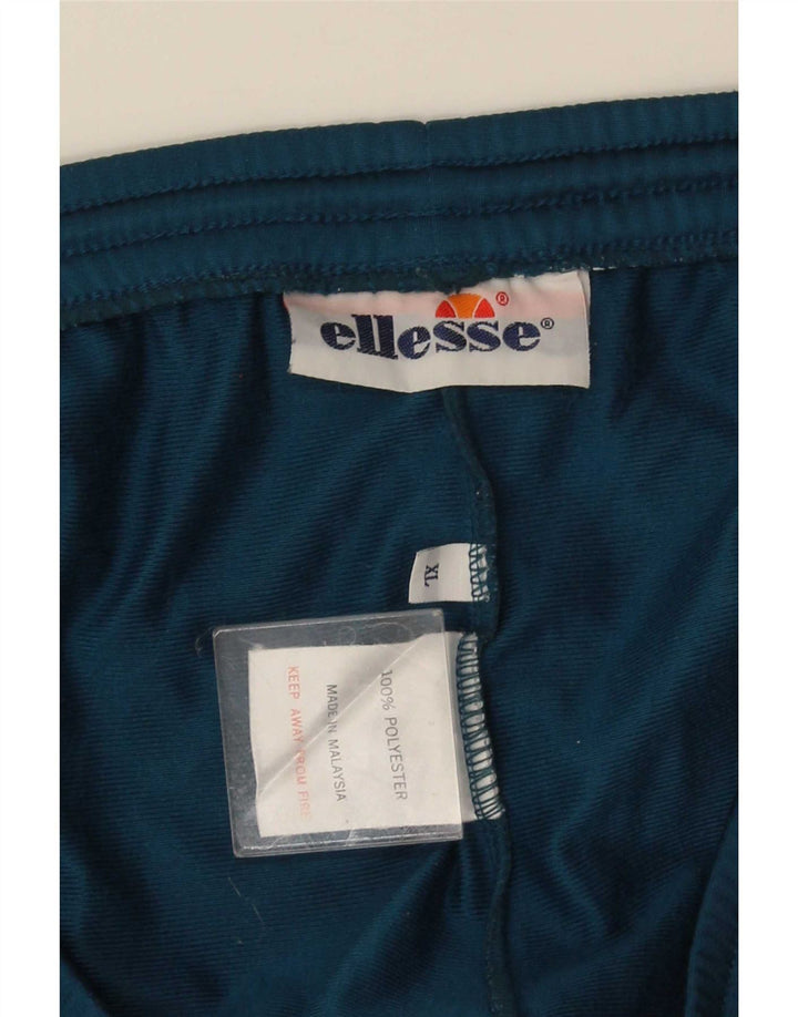 Ellesse Мужские спортивные брюки с графическим рисунком XL, синие, полиэстер с цветными блоками
