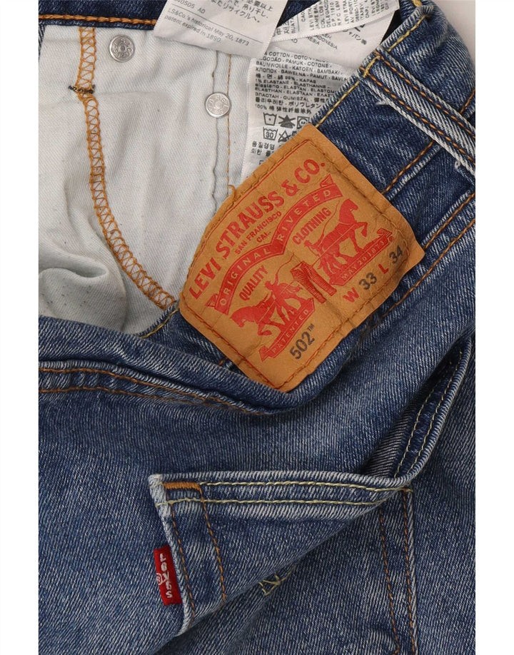 Мужские зауженные джинсы Levi's 502 W33 L28 синие, хлопок