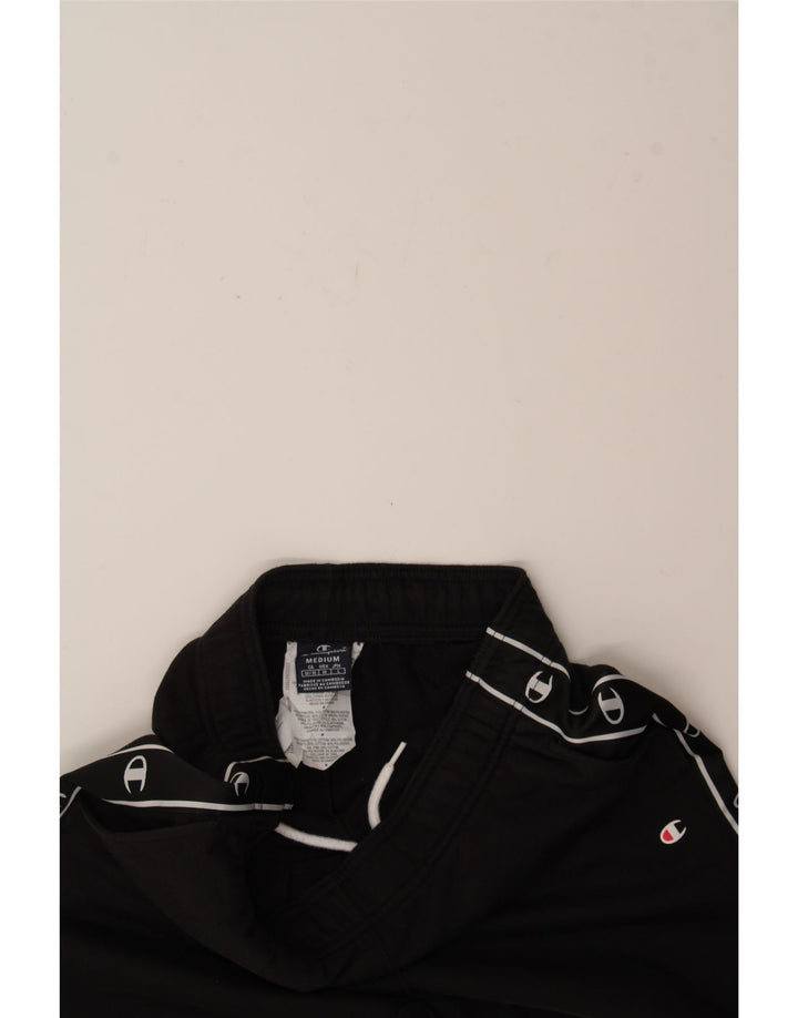 CHAMPION Mens Graphic Tracksuit Trousers Joggers Medium  Black Cotton Vintage Champion and Second-Hand Champion from Messina Hembry 