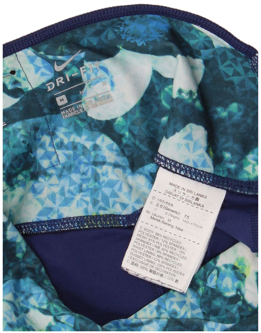 Женские леггинсы-капри Nike Dri Fit UK 12, средние, разноцветные с цветочным принтом