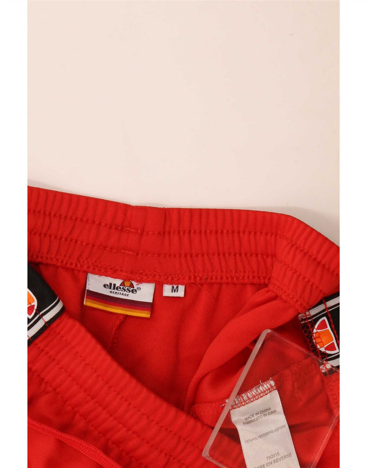 Ellesse Мужские спортивные брюки с графическим рисунком, средний красный полиэстер с цветными блоками