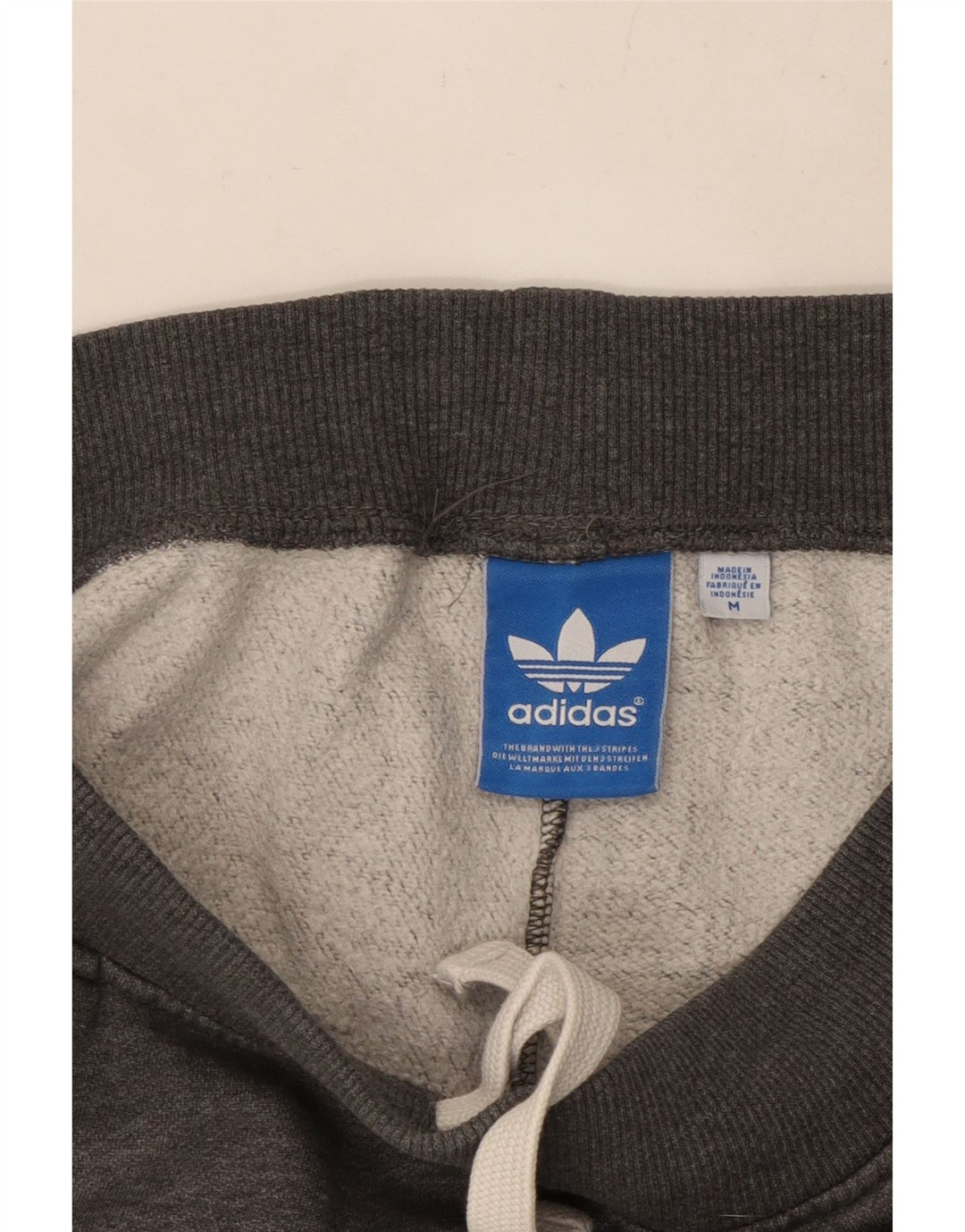 Мужские спортивные брюки ADIDAS с графическим рисунком, джоггеры, хлопок среднего серого цвета