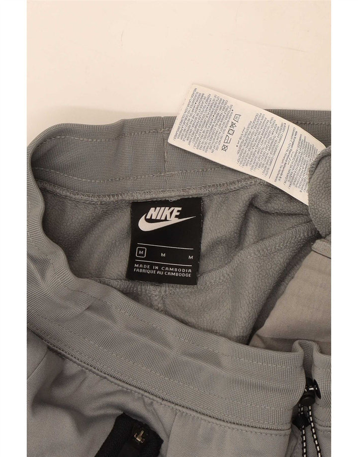 Мужские спортивные брюки Nike Спортивные брюки джоггеры среднего серого цвета из полиэстера с цветными блоками