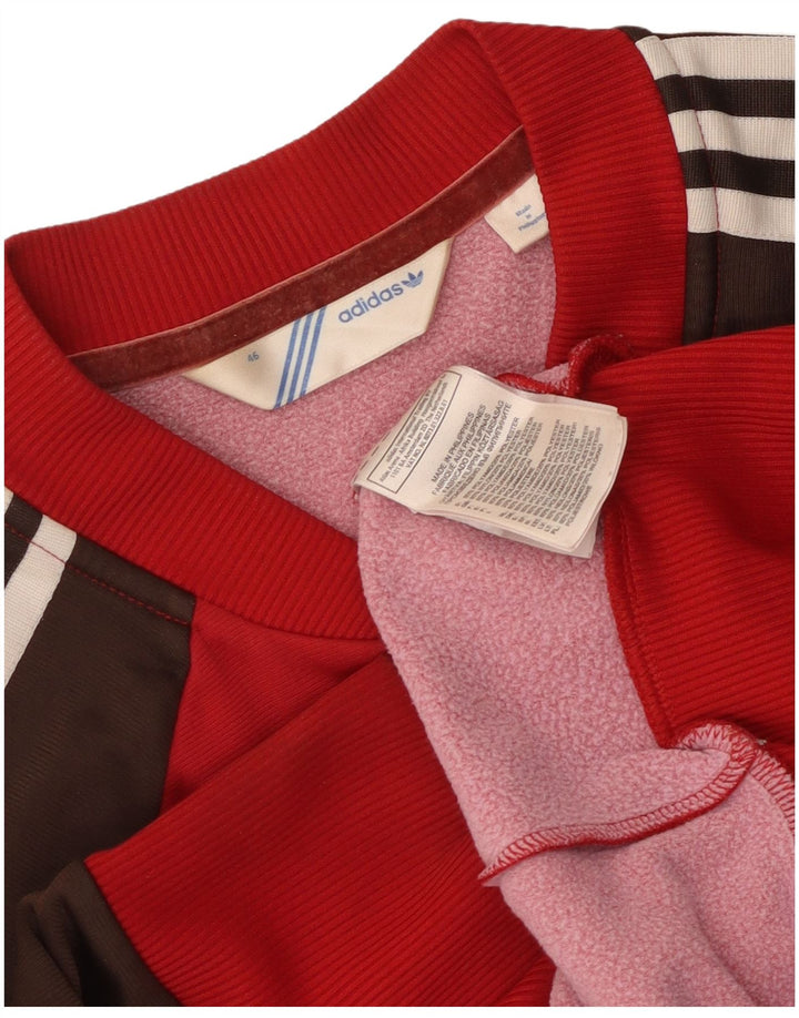 Adidas Женский спортивный костюм Top Jacket IT 46 Большой красный полиамид с цветными блоками