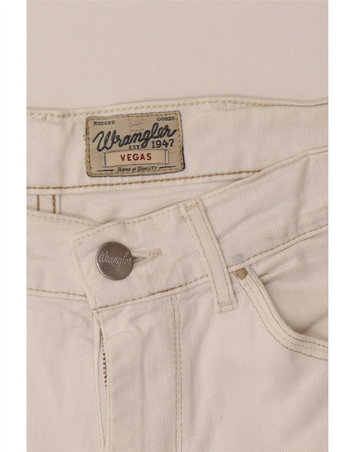 Джинсы Wrangler Vegas Slim W30 L32 белые