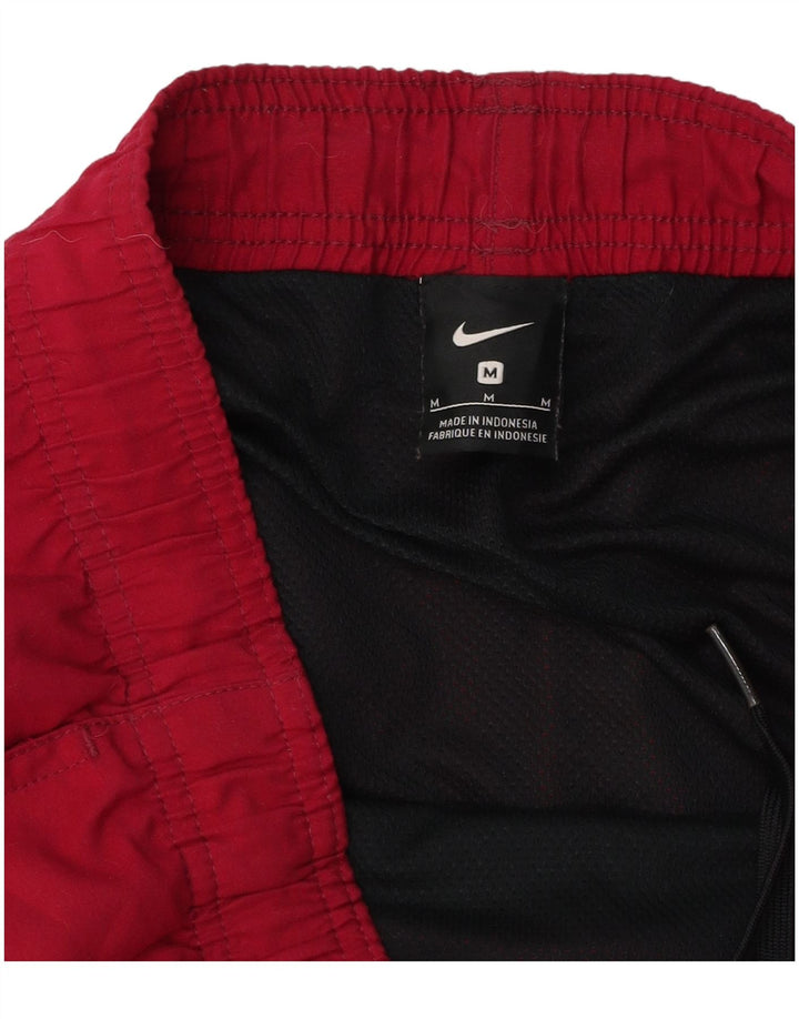 Мужские спортивные шорты NIKE среднего красного цвета